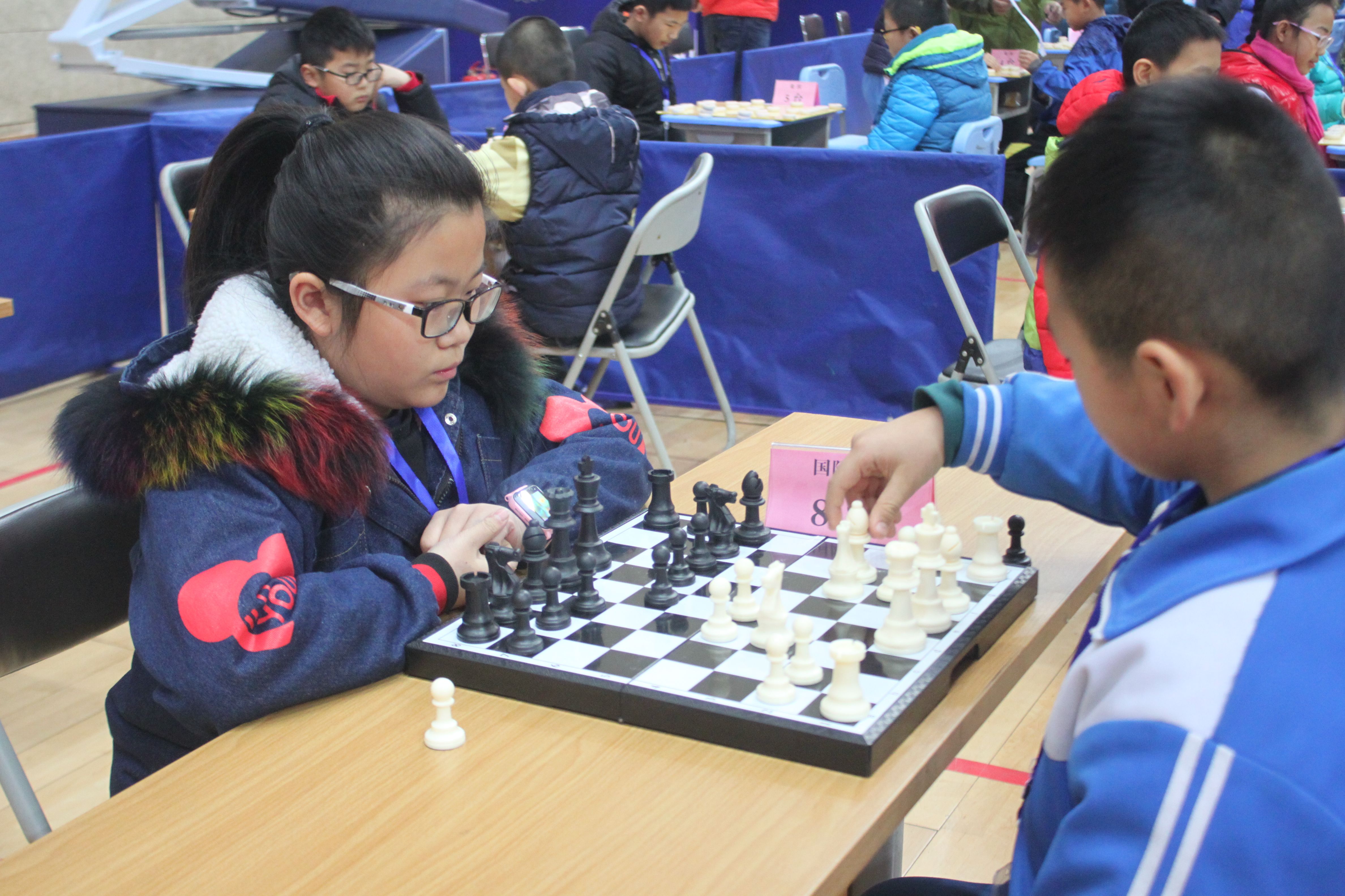 "乐无穷 乐在"棋" ——2017年济宁市任城区"体彩杯"中小学生棋类比赛